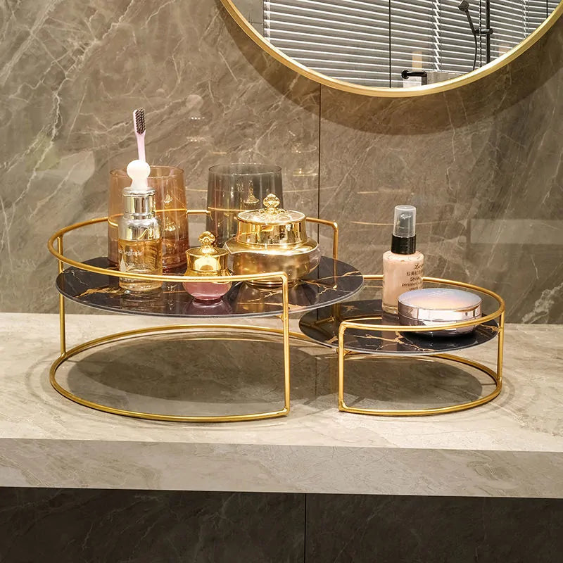 Marble-style glass storage rack holding toiletries